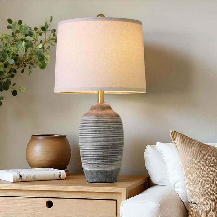 Vintage rustic ceramic table lamp with black and gray farmhouse design and linen drum shade