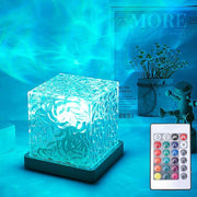 Ocean wave projector light displaying 3D water ripple effect with 16-color LED ambient lighting in a bedroom setting