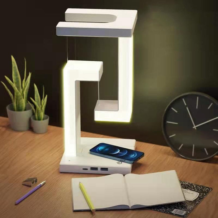 Modern wireless charging suspension table lamp floating above base with LED night light and touch control